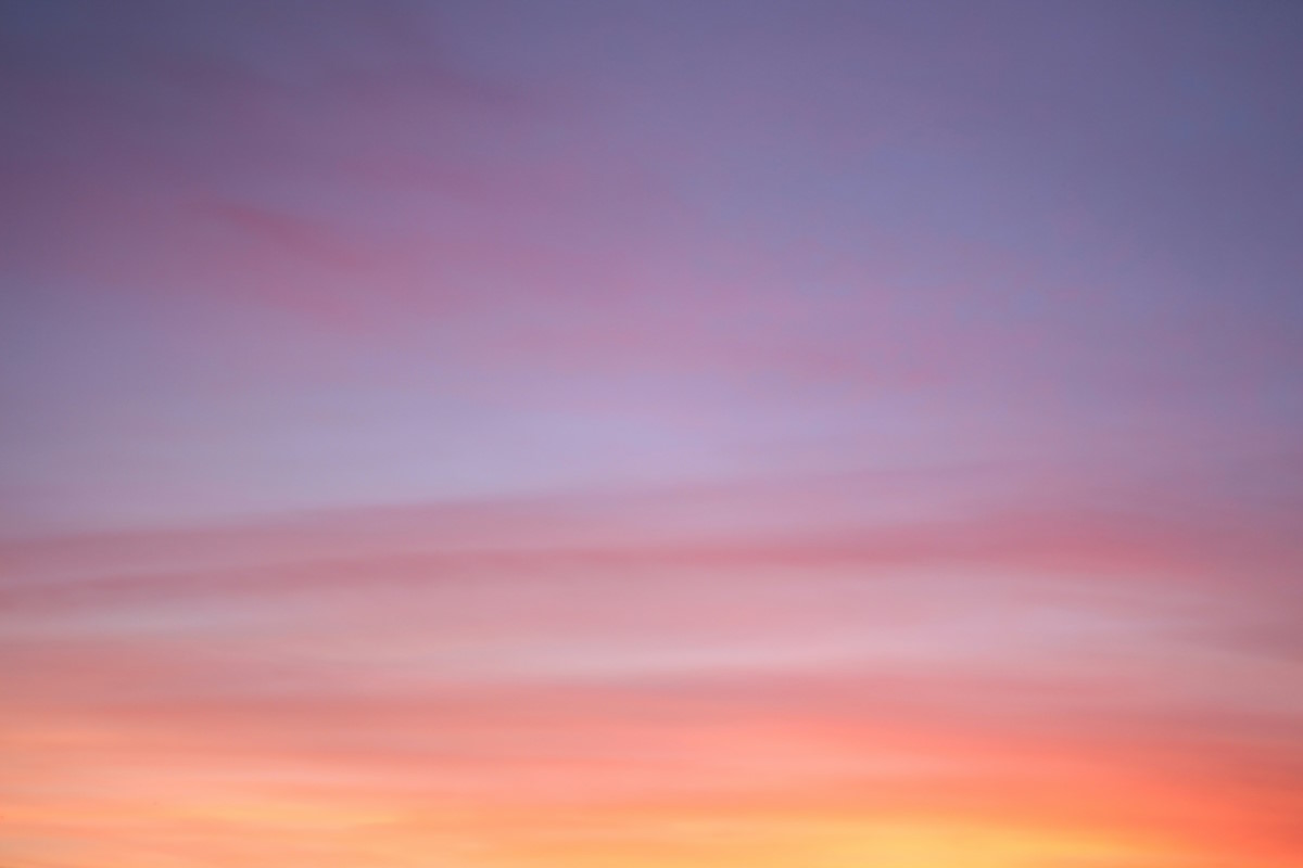 A picture of an orange and purple sunset, after the sun has gone down. 